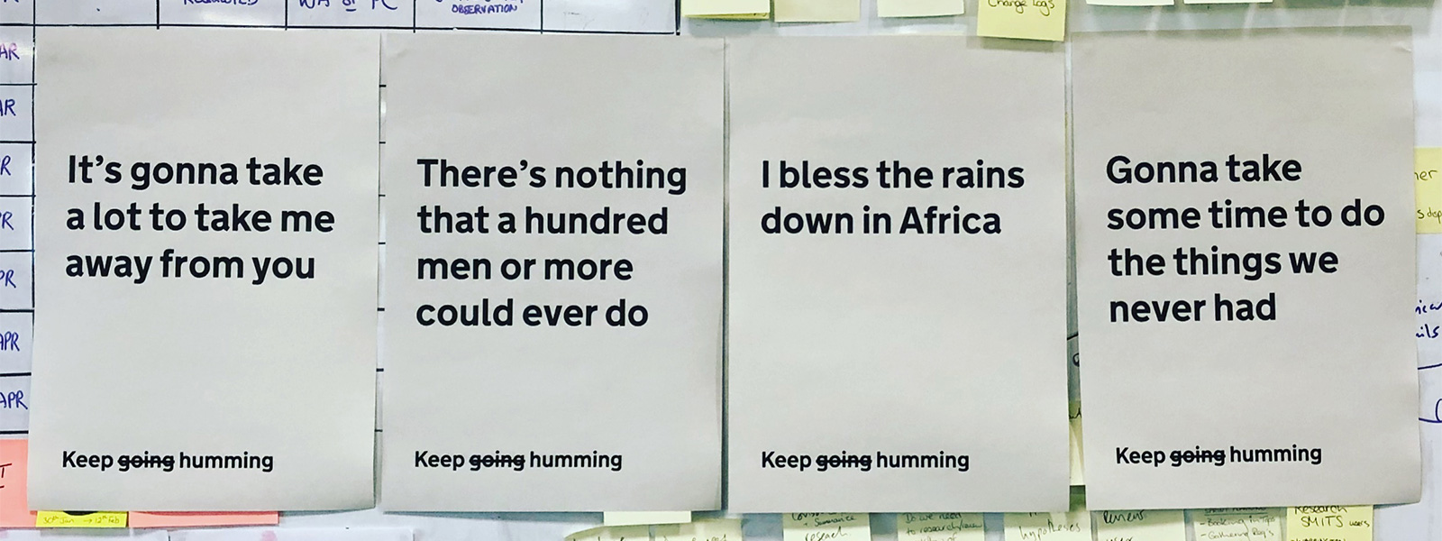 The chorus of Africa printed, line by line, onto posters we have hung up in our office